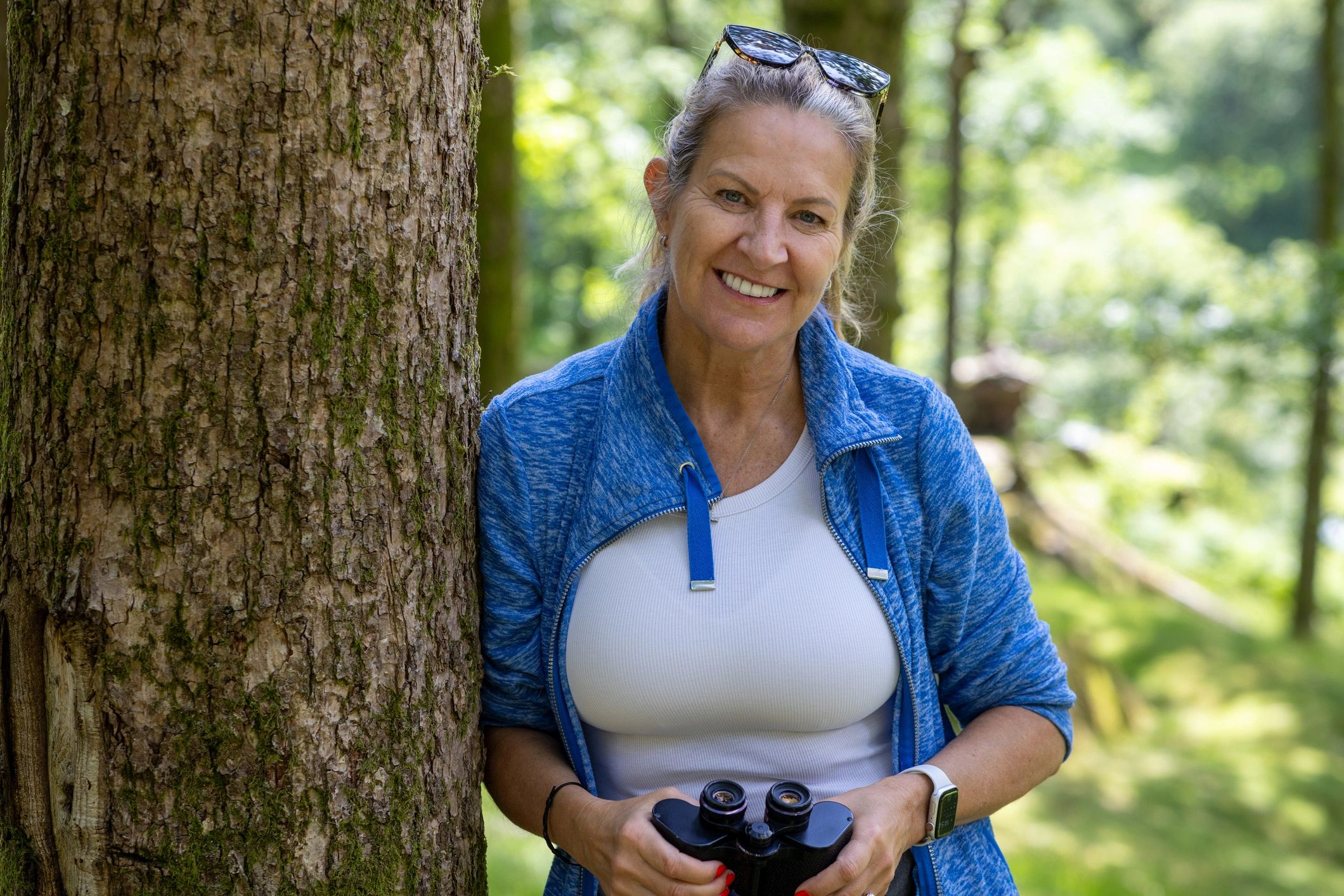 Woman in nature reflecting mindfully